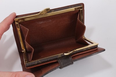 Lot 2089 - Louis Vuitton vanity case with fitted interior, signature monogrammed and brass fittings, together with a Louis Vuitton purse and Louis Vuitton key fob with two keys, label numbered 1029952, lock a...
