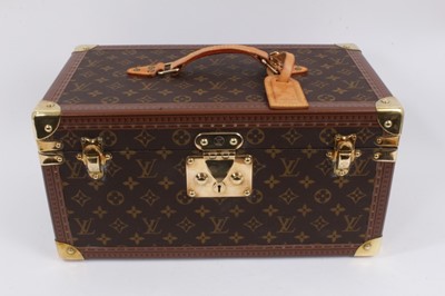 Lot 2089 - Louis Vuitton vanity case with fitted interior, signature monogrammed and brass fittings, together with a Louis Vuitton purse and Louis Vuitton key fob with two keys, label numbered 1029952, lock a...
