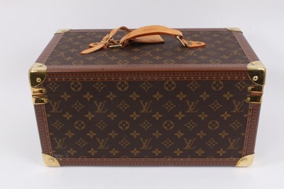 Lot 2089 - Louis Vuitton vanity case with fitted interior, signature monogrammed and brass fittings, together with a Louis Vuitton purse and Louis Vuitton key fob with two keys, label numbered 1029952, lock a...