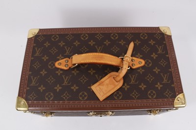 Lot 2089 - Louis Vuitton vanity case with fitted interior, signature monogrammed and brass fittings, together with a Louis Vuitton purse and Louis Vuitton key fob with two keys, label numbered 1029952, lock a...