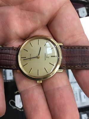 Lot 608 - 1970s Omega De Ville 9ct gold wristwatch on leather strap