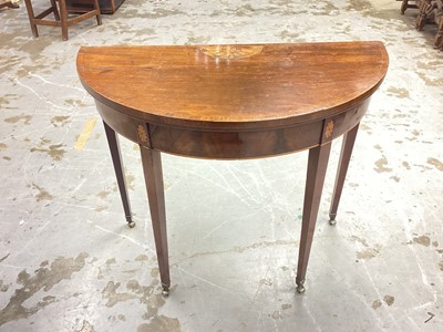Lot 1524 - George III mahogany tulip wood crossbanded and patera inlaid demi-lune card table, fold-over top enclosing fitted green baize playing surface, on square tapered legs, 92cm wide x 45cm deep x 75cm h...