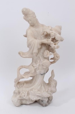 Lot 703 - Chinese carved soapstone figure of Guanyin