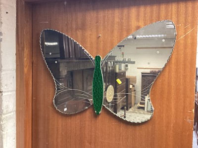 Lot 1130 - Two frameless wall mirrors, one in the form of a butterfly with green tinted body