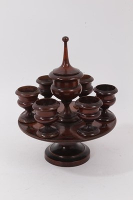 Lot 771 - 19th century fruitwood treen egg stand