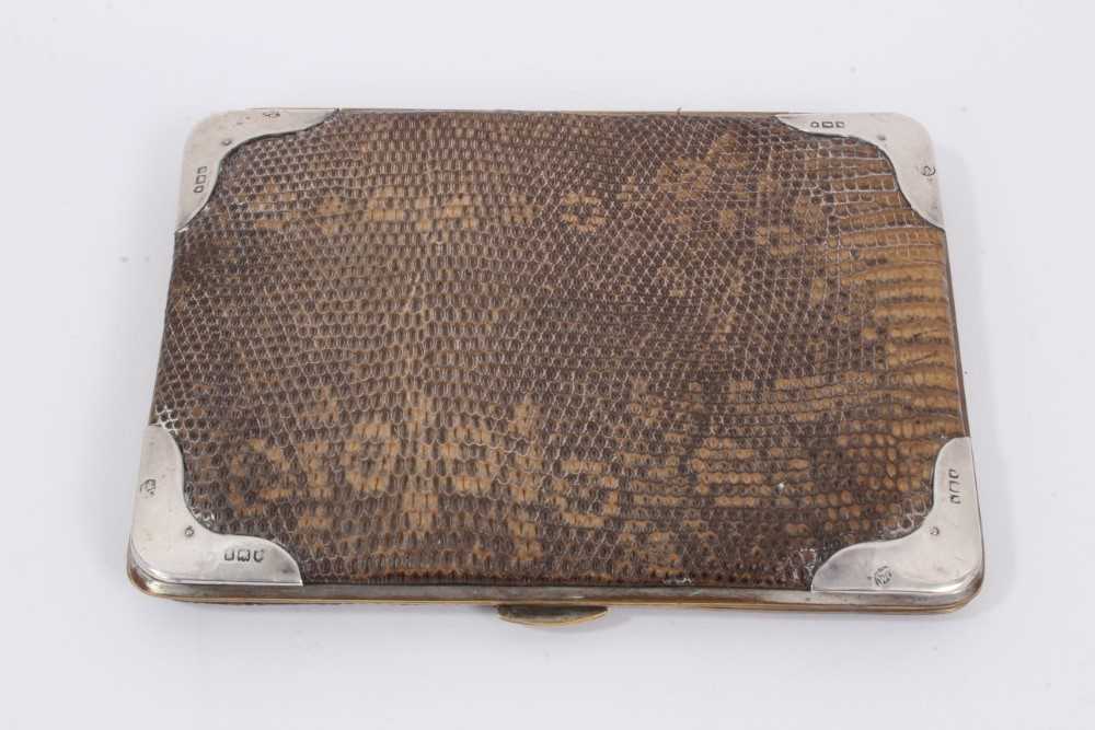 Lot 847 - Snake skin wallet with silver mounts (London 1903) 14cm x 10.5cm