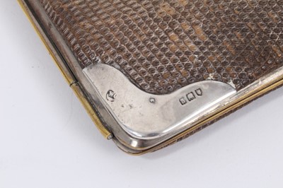 Lot 847 - Snake skin wallet with silver mounts (London 1903) 14cm x 10.5cm