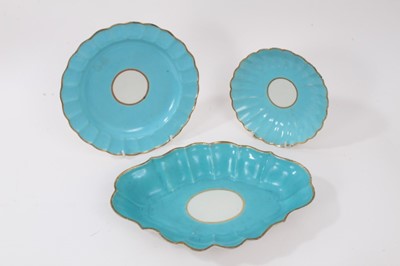 Lot 79 - A Worcester turquoise ground lozenge shaped dish, a saucer dish and a plate, circa 1770