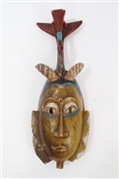 Lot 868 - Old African carved wooden tribal mask with...