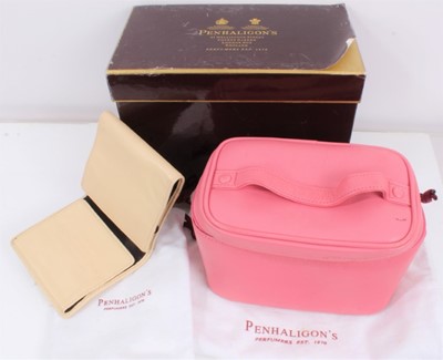 Lot 488 - Penhaligon's pink leather travel vanity case and cream leather travel jewellery wallet, both in dust bags, in one box