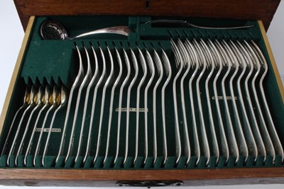 Lot 316 - Early 20th century silver plated canteen of cutlery in Art Nouveau oak cabinet