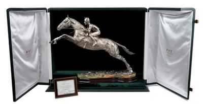 Lot 900 - A fine and highly impressive silver sculpture of Desert Orchid with Simon Sherwood up, realistically modelled rising for a jump
