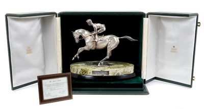 Lot 901 - A fine and impressive silver sculpture, 'The Final Frame', Lester Piggott on horseback, raised upon an oval green variegated marble base and oval wooden plinth, hallmarked London 1986