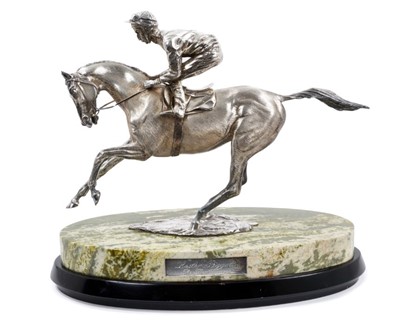 Lot 901 - A fine and impressive silver sculpture, 'The Final Frame', Lester Piggott on horseback, raised upon an oval green variegated marble base and oval wooden plinth, hallmarked London 1986