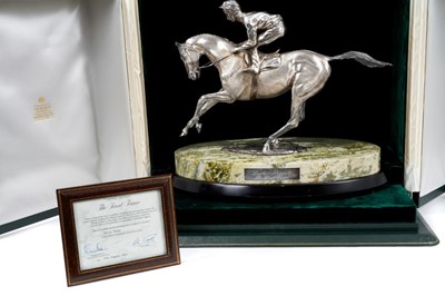 Lot 901 - A fine and impressive silver sculpture, 'The Final Frame', Lester Piggott on horseback, raised upon an oval green variegated marble base and oval wooden plinth, hallmarked London 1986