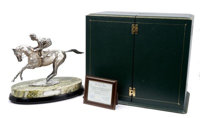 Lot 901 - A fine and impressive silver sculpture, 'The Final Frame', Lester Piggott on horseback, raised upon an oval green variegated marble base and oval wooden plinth, hallmarked London 1986