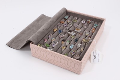 Lot 822 - Collection of 43 silver gem set dress rings displayed in a ring tray