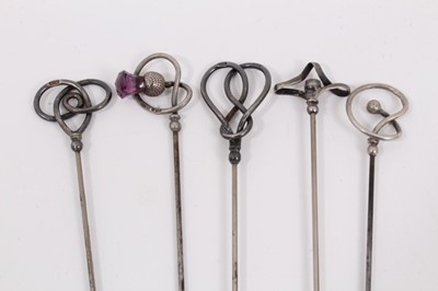 Lot 886 - Collection of twelve vintage hat pins including five silver pins by Charles Horner, three enamelled pins and four set with gem stones/ beads