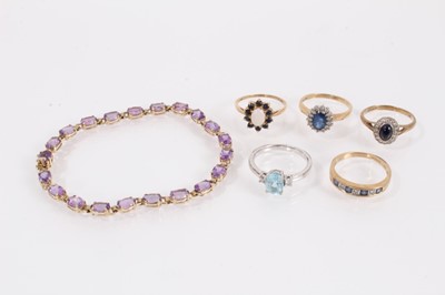 Lot 834 - Five 9ct gold gem set dress rings and 9ct gold gem set bracelet