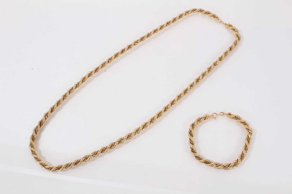 Lot 536 - 18ct white and yellow gold rope twist necklace and matching bracelet, marked 750.
