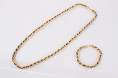 Lot 536 - 18ct white and yellow gold rope twist necklace and matching bracelet, marked 750.