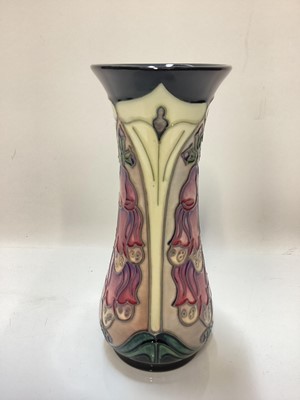 Lot 1248 - Moorcroft pottery vase decorated in the Foxglove pattern, signed and dated 93, 20.5cm high