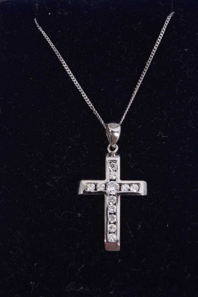Lot 874 - 9ct white gold and synthetic white stone cross pendant on 9ct white gold chain