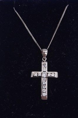 Lot 874 - 9ct white gold and synthetic white stone cross pendant on 9ct white gold chain