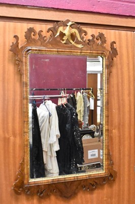 Lot 1376 - George II style walnut fret work wall mirror