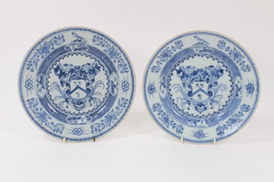 Lot 5 - A rare pair of Chinese blue and white armorial plates, circa 1730