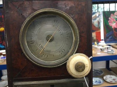Lot 666 - Fine quality George III stick barometer in burr wood case with arched swan neck pediment and central brass ball mount, with silvered dials signed Nairne & Blunt of London, 112cm high