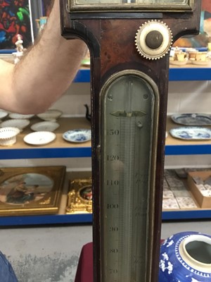 Lot 666 - Fine quality George III stick barometer in burr wood case with arched swan neck pediment and central brass ball mount, with silvered dials signed Nairne & Blunt of London, 112cm high