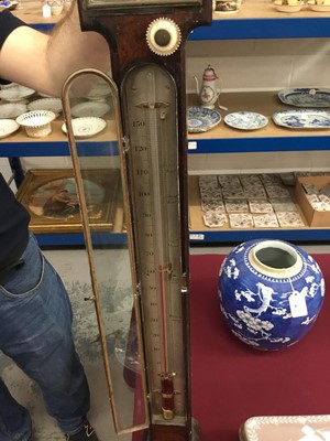 Lot 666 - Fine quality George III stick barometer in burr wood case with arched swan neck pediment and central brass ball mount, with silvered dials signed Nairne & Blunt of London, 112cm high