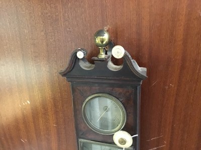 Lot 666 - Fine quality George III stick barometer in burr wood case with arched swan neck pediment and central brass ball mount, with silvered dials signed Nairne & Blunt of London, 112cm high
