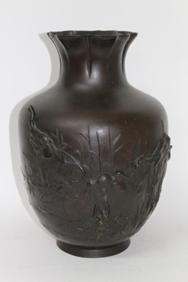 Lot 789 - Japanese bronze vase decorated with elephants in relief