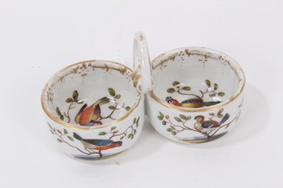 Lot 65 - A Meissen double salt with loop handle, polychrome decorated with birds, 9.5cm wide