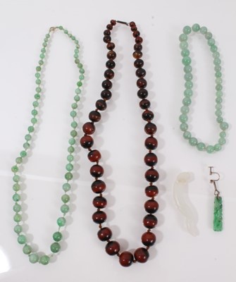 Lot 490 - Chinese jade bead necklace, one other, a  jade pendant, jade earring, and tortoiseshell/horn bead necklace