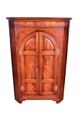Lot 1336 - George III mahogany corner cupboard