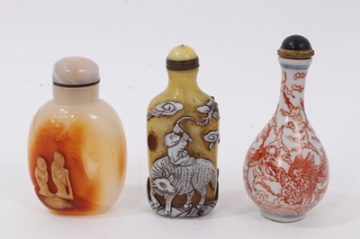 Lot 805 - Carved agate snuff bottle, two others