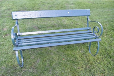 Lot 1339 - Antique cast iron garden bench, with slat back and seat and scroll ends, 154cm long