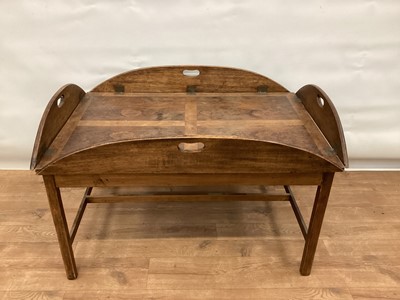 Lot 1367 - Oak and yewwood butlers' tray on stand, typical hinged form with integral pierced handles, on square section frame 95 x 67cm