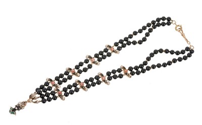 Lot 405 - 19th century gold enamel and gem-set blackamoor necklace, the pendant drop in the form of a blackamoor head wearing a coral diamond and enamel turban surmounted with a diamond star and crescent, su...