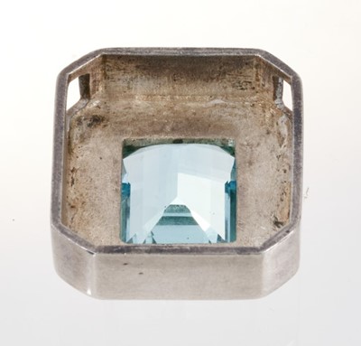Lot 461 - Large aquamarine pendant with a rectangular step cut aquamarine measuring approximately 19.5mm x 17mm in heavy rectangular silver setting, 34mm x 31mm.