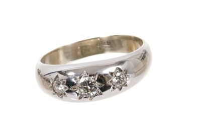 Lot 442 - Diamond three stone ring with three brilliant cut diamonds in gypsy style 18ct white gold setting, estimated total diamond weight approximately 0.40cts. Ring size P.