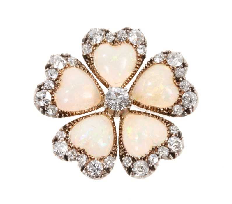 Lot 476 - Late Victorian opal and diamond flower brooch in the form of a pansy, with five heart shaped opal petals and old cut diamonds in silver and gold setting, 24mm.