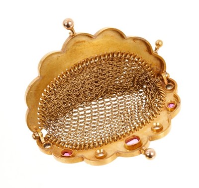 Lot 481 - Late 19th century French gold ruby and diamond purse with three oval mixed cut rubies and four rose cut diamonds and gold chain mail links, French eagle's head control marks, 90mm.
