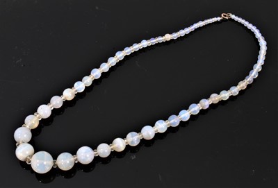 Lot 491 - Antique opal bead necklace with a string of graduated opal beads measuring 13.5mm - 2.8mm with faceted crystal spacers, 45cm.