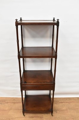 Lot 1497 - Regency mahogany four tier whatnot, with column supports and frieze drawer on castors, 48cm wide x 38cm deep x 144cm high