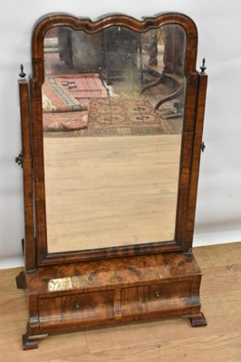 Lot 1465 - George I style figured walnut dressing table mirror, with ogee shaped swing mirror plate and two drawers to the platform base on bracket feet, 42cm wide