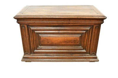 Lot 1466 - 17th century Continental oak cassone, of small size, with hinged lid and interior candle box, panelled front flanked by iron carrying handles, on stiles